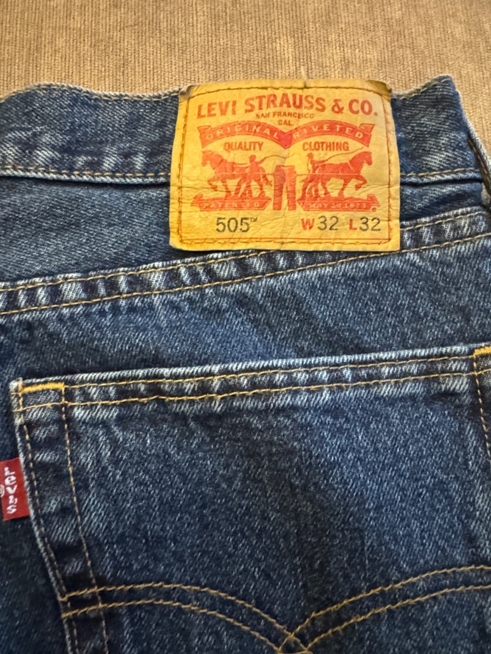 Levi's Blue Denim Jeans with Gold Patch